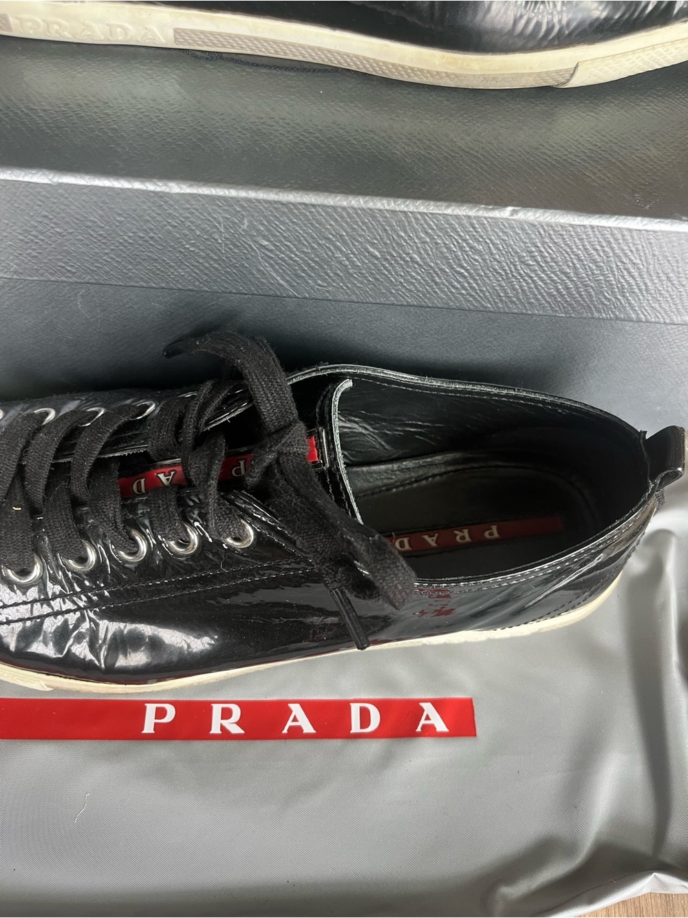 Prada women’s Patent Leather Low-Top Sneakers - Picture 2 of 5